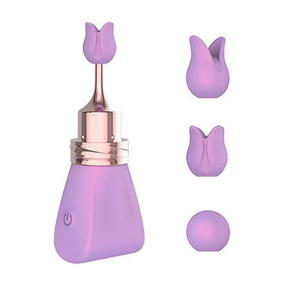 Purple bullet vibrator with three replaceable nozzles on the side on a white background