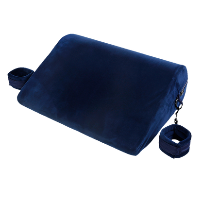 Velvet blue triangle sex pillow with rounded corners and attached cuffs on both sides